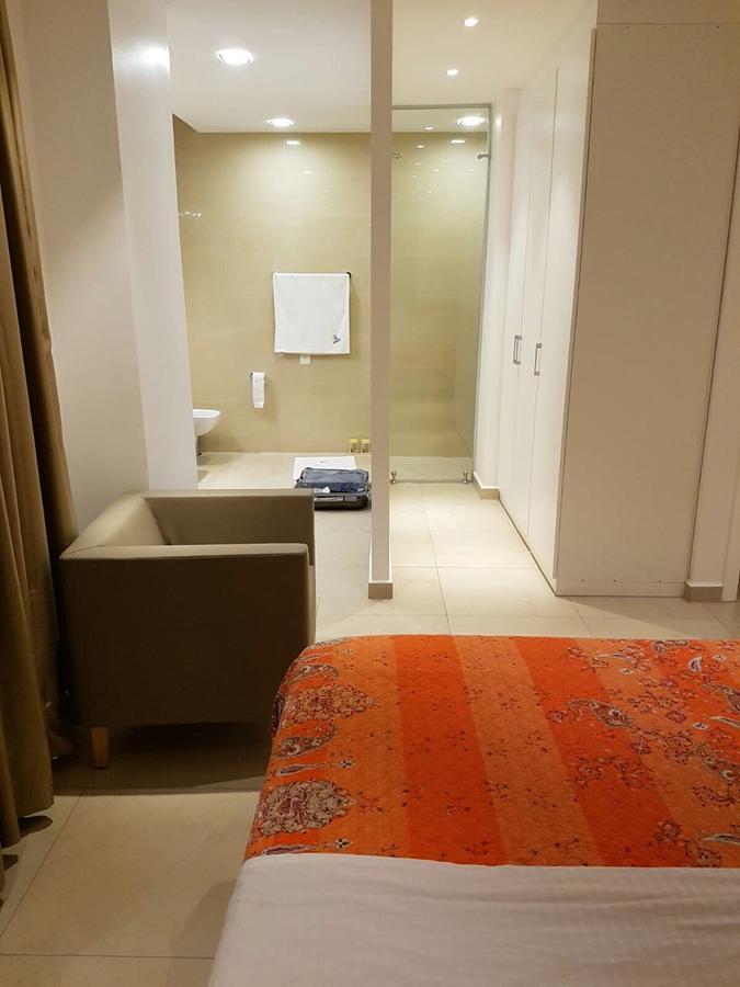 Suncity Hotel Apartment Acra Exterior foto